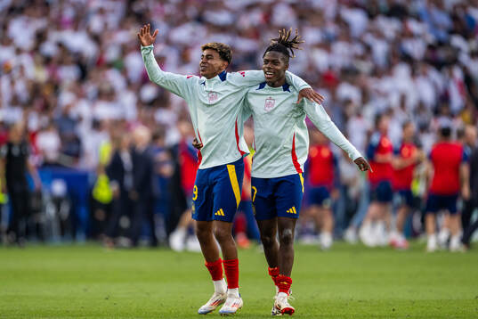 Lamine Yamal and Nicholas Williams of Spain celebrate