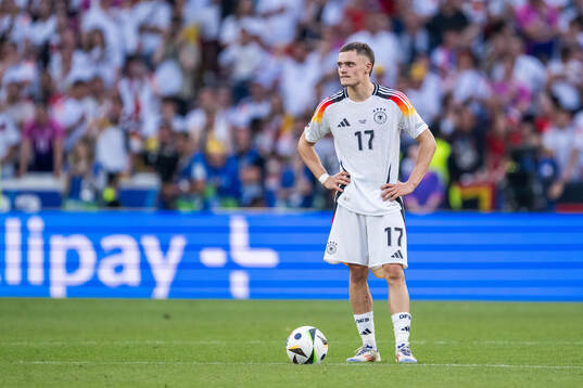 Florian Wirtz of Germany looks dejected