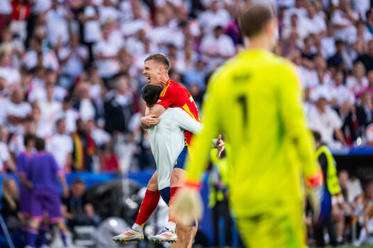 Alvaro Morata and Daniel Olmo of Spain celebrate