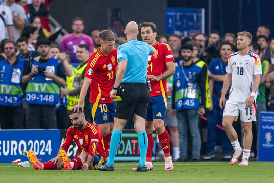 Daniel Carvajal of Spain looks dejected as he receives a