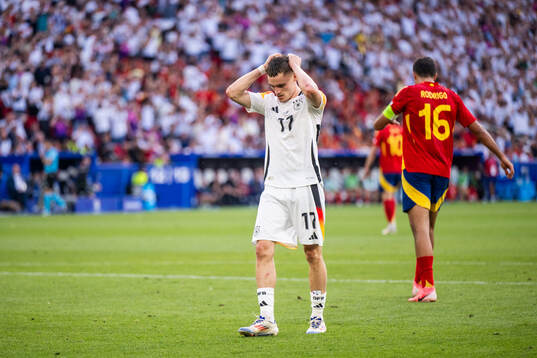 Florian Wirtz of Germany looks dejected
