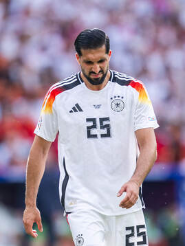 Emre Can of Germany looks dejected