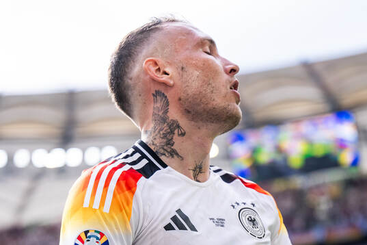 David Raum of Germany looks dejected