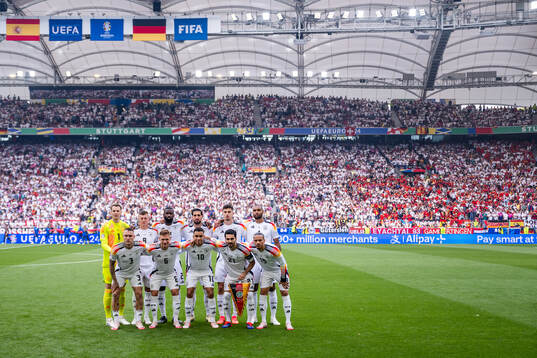 The starting eleven of Germany pose for a phot