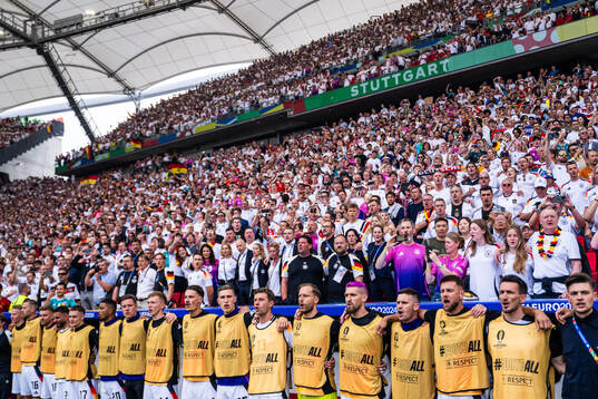 Players of Germany sing the national anthem