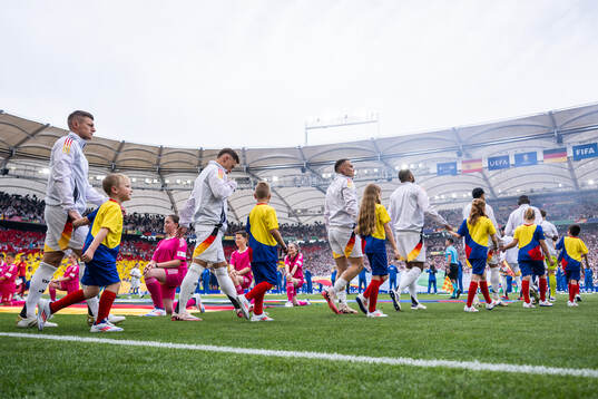 Toni Kroos and Joshua Kimmich of Germany enter the pitch