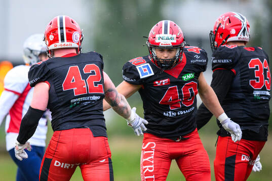 Carlstad Crusaders Mattias Eriksson jublar med Alex Gudding