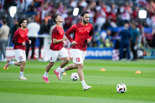 Hakan Calhanoglu of Turkey