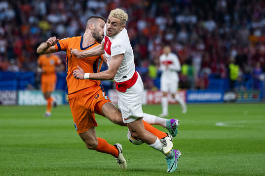 Stefan De Vrij of Netherlands and Baris Alper Yilmaz of