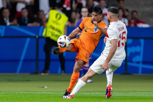Tijjani Reijnders of Netherlands and Salih Özcan of Turkey