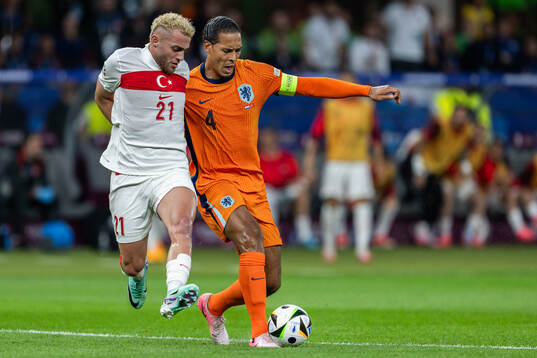 Baris Alper Yilmaz of Turkey and Virgil van Dijk of