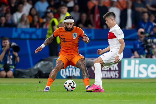 Memphis Depay of Netherlands and Arda Guler of Turkey