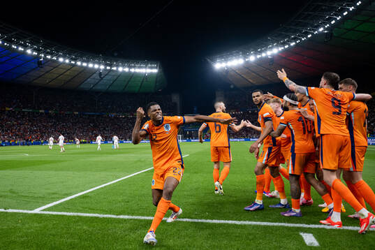 Denzel Dumfries of Netherlands celebrates