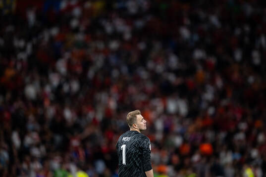 Goalkeeper Mert Gunok of Turkey looks dejected