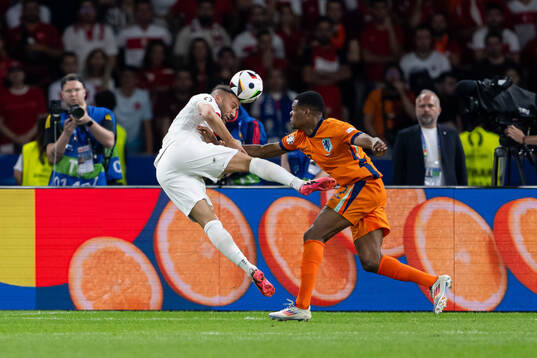 Cenk Tosun of Turkey and Denzel Dumfries of Netherlands