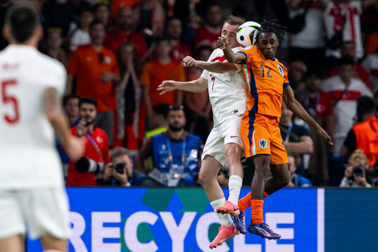 Kerem Akturkoglu of Turkey and Jeremie Frimpong of