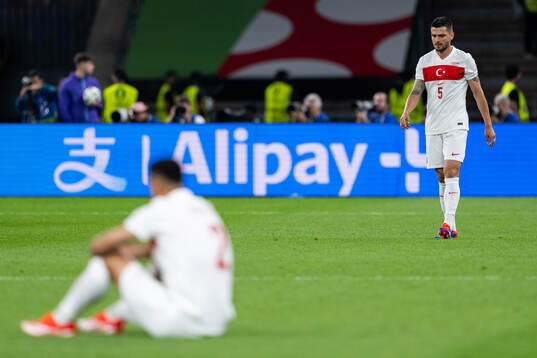 Okay Yokuslu of Turkey looks dejected
