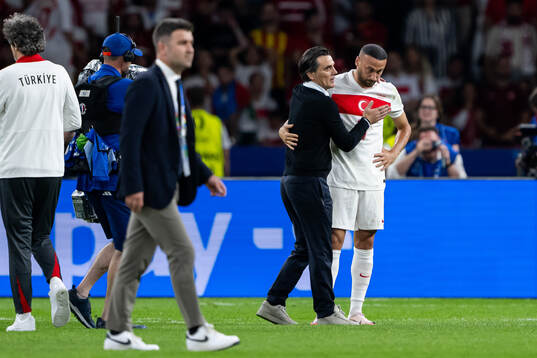 Head coach Vincenzo Montella and Cenk Tosun of Turkey look