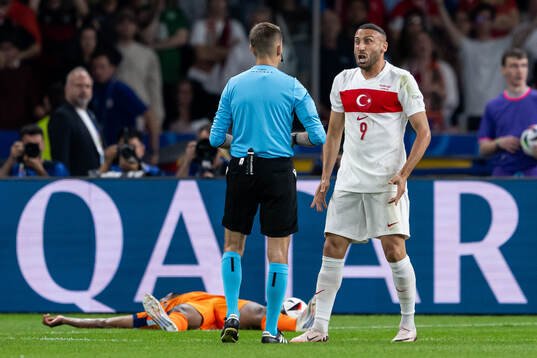 Cenk Tosun of Turkey reacts