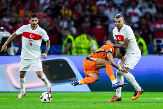 Cody Gakpo of Netherlands and Abdulkerim Bardakci of Turkey