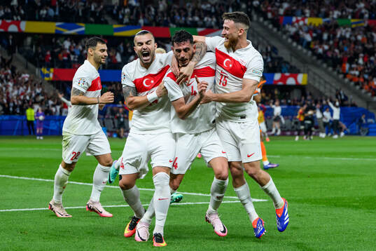 Samet Akaydin of Turkey celebrates with Abdulkerim Bardakci