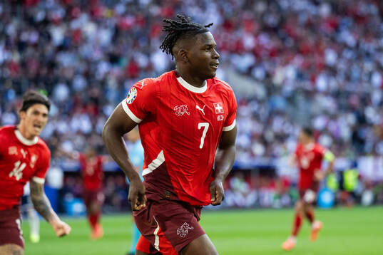 Breel Embolo of Switzerland celebrates