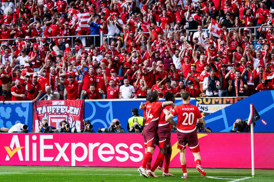 Breel Embolo of Switzerland celebrates with team mates