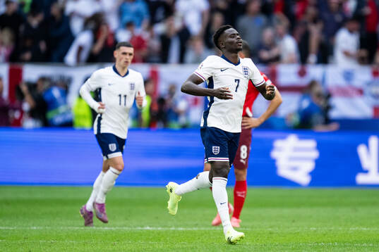 Bukayo Saka of England celebrates