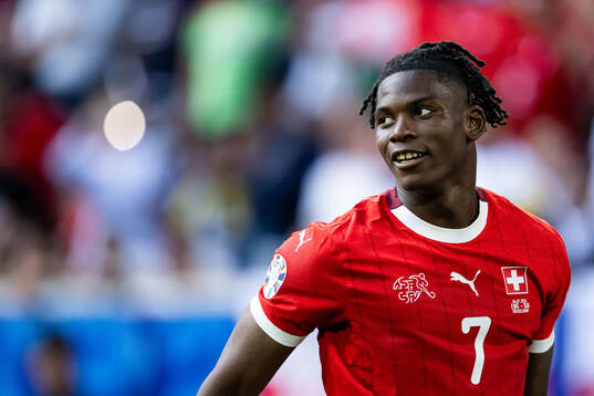 Breel Embolo of Switzerland celebrates