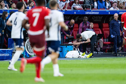 Harry Kane of England in pain