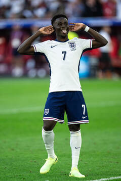 Bukayo Saka of England celebrates