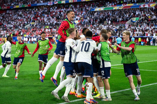 Players of England celebrate