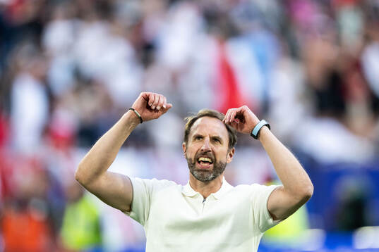 Head coach Gareth Southgate of England celebrates