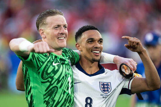 Goalkeeper Jordan Pickford and Trent Alexander-Arnold of