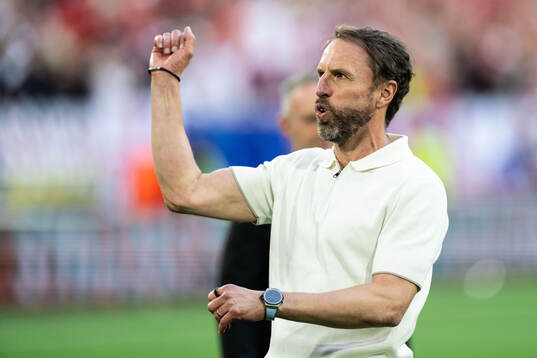 Head coach Gareth Southgate of England celebrates