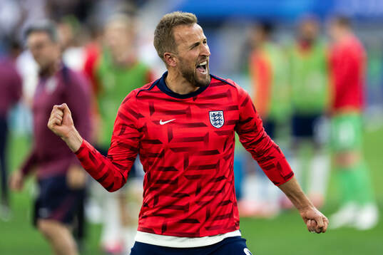 Harry Kane of England celebrates