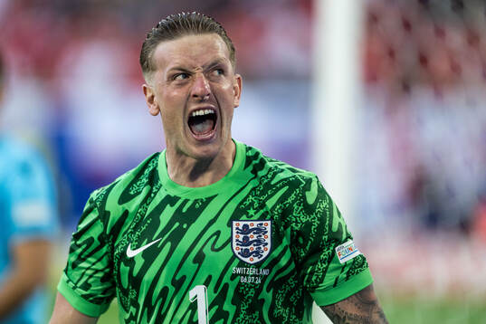 Goalkeeper Jordan Pickford of England celebrates