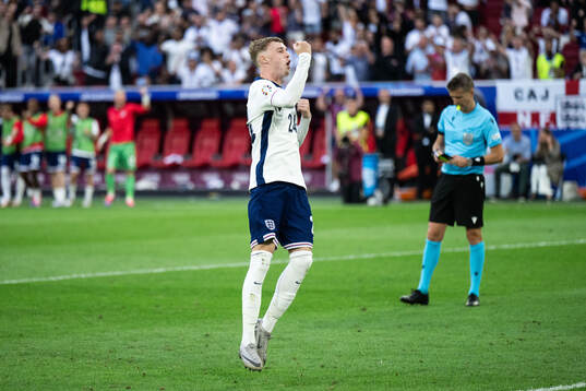 Cole Palmer of England celebrates