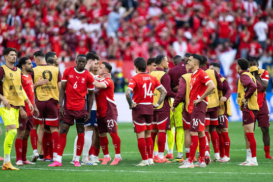 Players of Switzerland look dejected