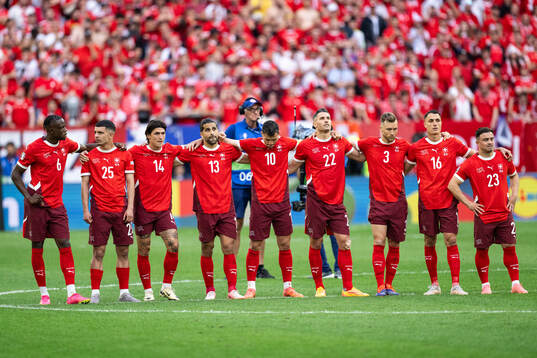 Players of Switzerland at the penalty shootouts