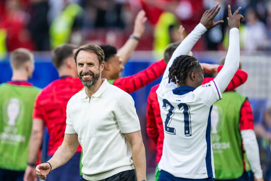 Head coach Gareth Southgate of England celebrates