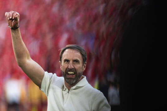 Head coach Gareth Southgate of England celebrates