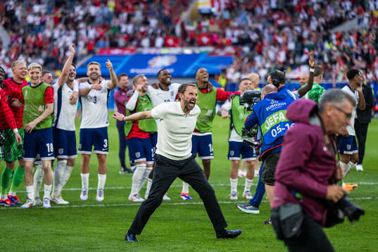 Head coach Gareth Southgate of England celebrates