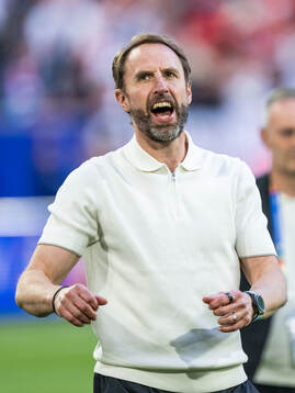 Head coach Gareth Southgate of England celebrates