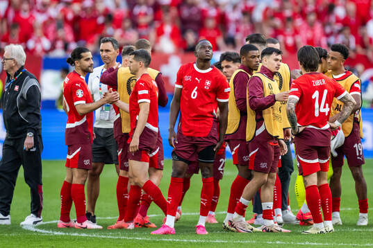 Denis Zakaria of Switzerland looks dejected