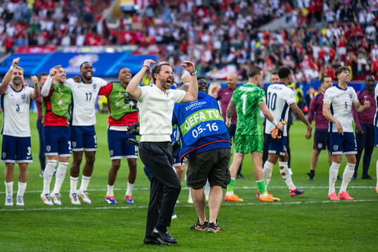 Head coach Gareth Southgate of England celebrates