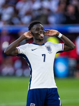 Bukayo Saka of England celebrates