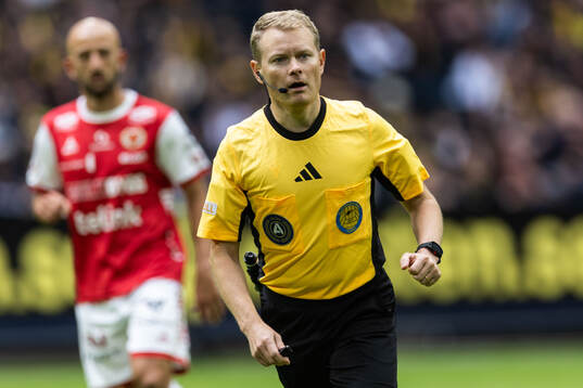 Domare Fredrik Klitte