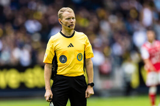 Domare Fredrik Klitte