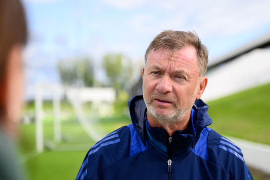 Head coach Peter Gerherdsson is being interviewed